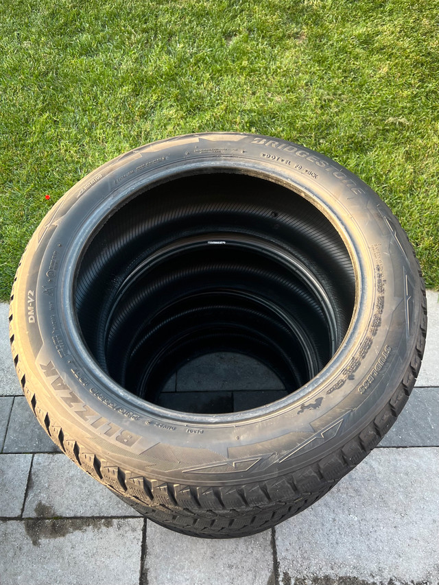 USED - 235/55/19 Bridgestone blizzak DM-V2 winter tires - photo 2