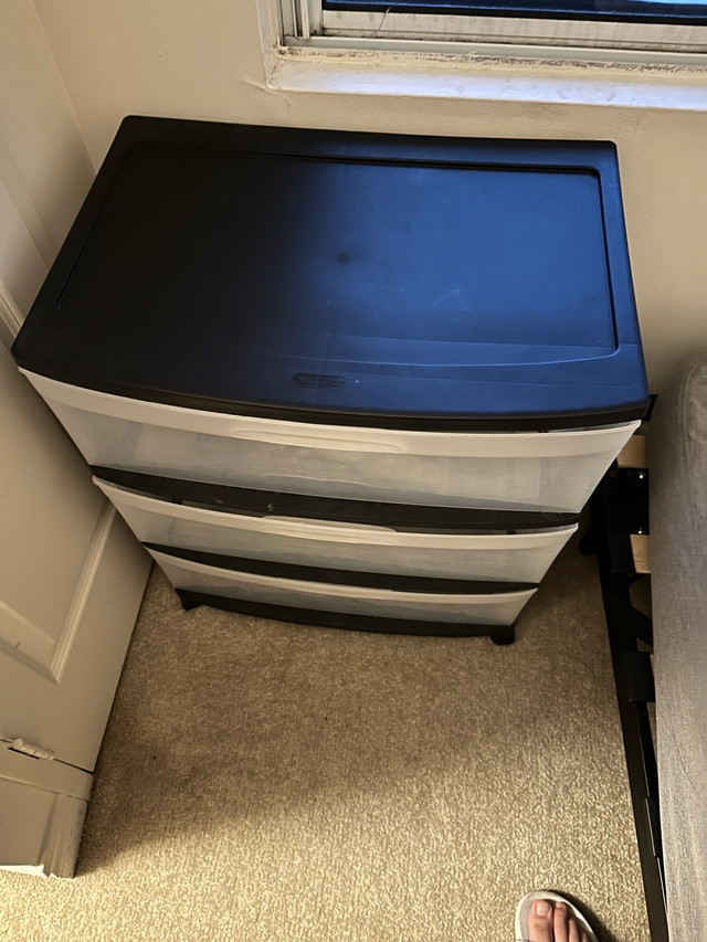 2 plastic shelving cabinets with wheels for sale