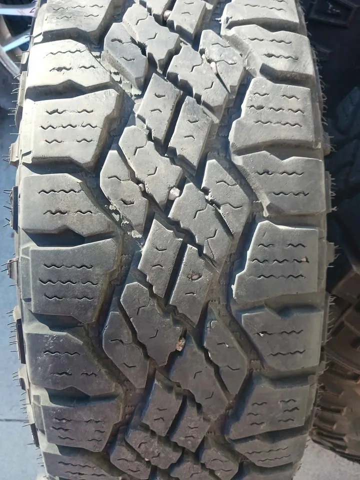 255/70r18 GOODYEAR WRANGLER TIRES & DODGE JEEP RIMS image indicator(2)