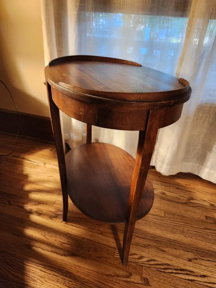 Vintage oval shaped wood table approx 17"W x 23.5"L x 26"H thumbnail