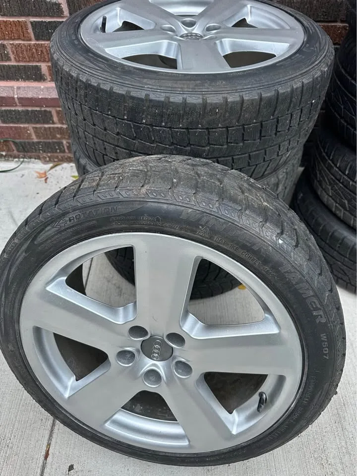 Audi 18” OEM rims with winter tires image indicator(2)