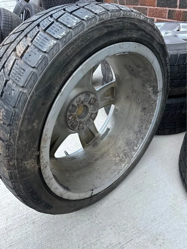 Audi 18” OEM rims with winter tires image indicator(7)