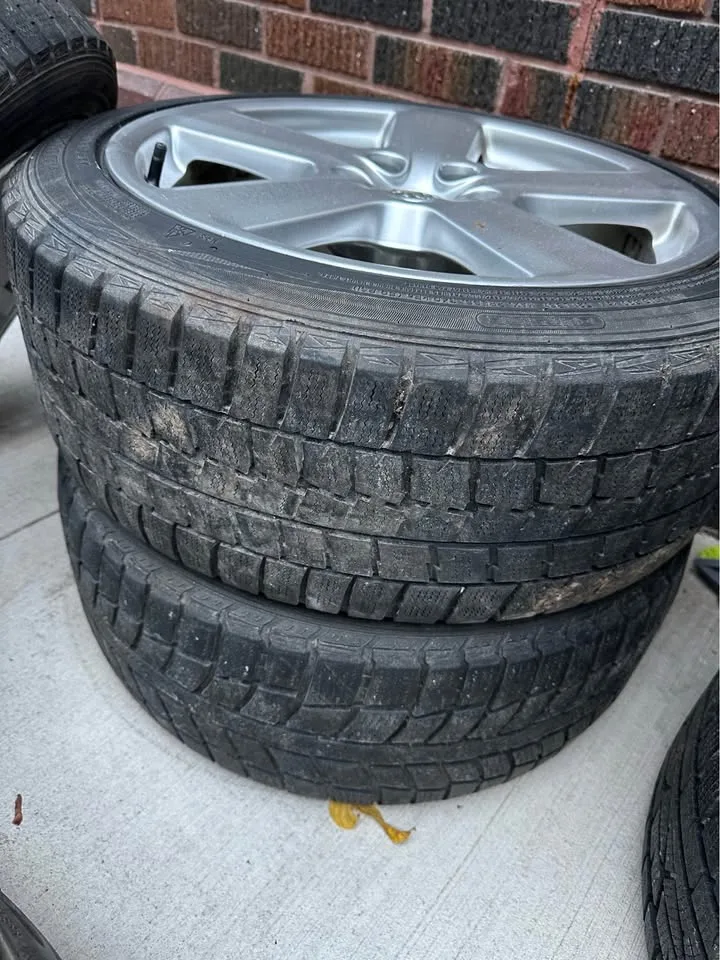 Audi 18” OEM rims with winter tires image indicator(10)