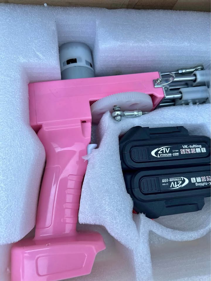Rug tufting gun