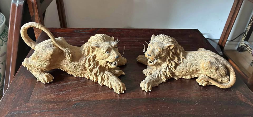 A pair of Chinese ceramic lion statue