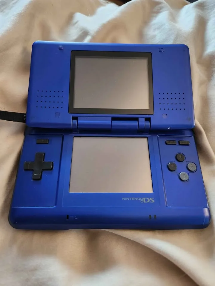 Original cobalt blue Nintendo DS with charger image indicator(2)