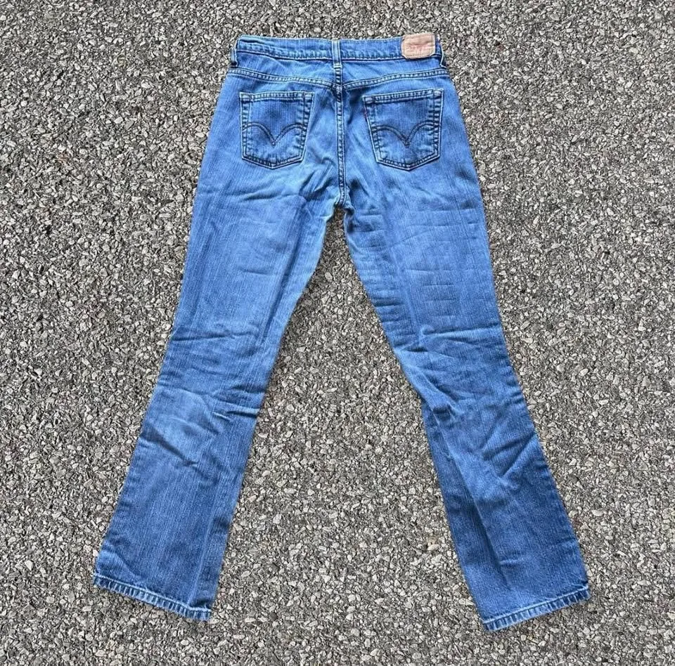 Vintage Levi's 515 Jeans Women’s Size 4 Light Wash y2k image indicator(3)