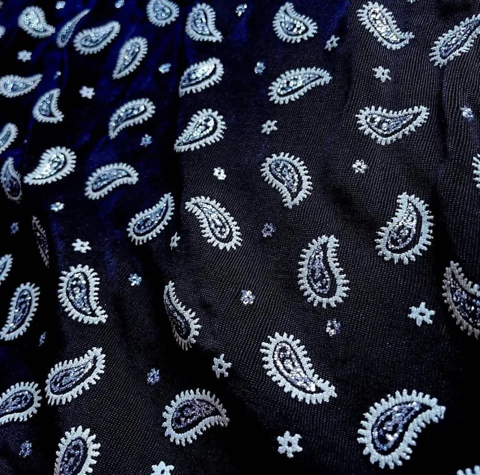 vintage black polo shirt with a cute pattern image indicator(2)