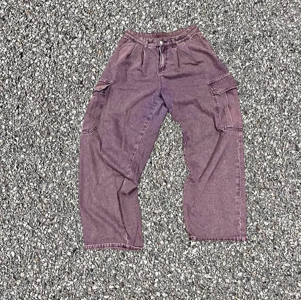 purple cargo pants with a unique, worn look
