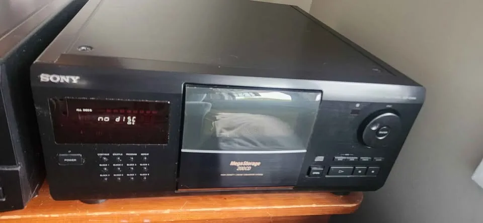 2 X Sony Mega CD storage with remote control image indicator(2)