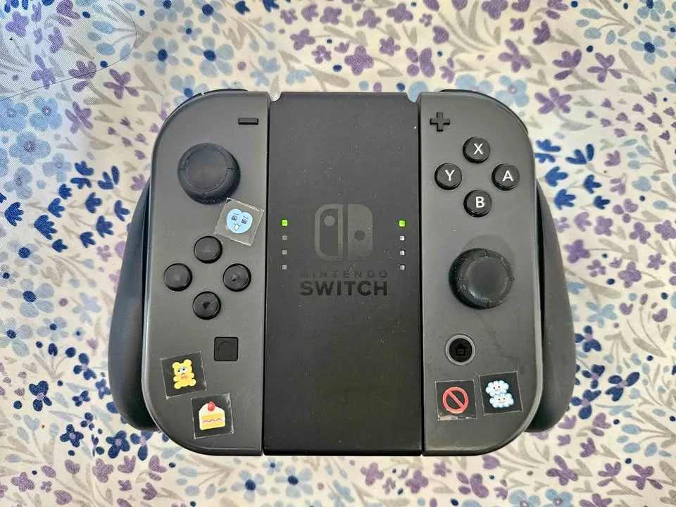 Nintendo Switch + Super Smash Bros, with Joy-Cons, Grip... thumbnail