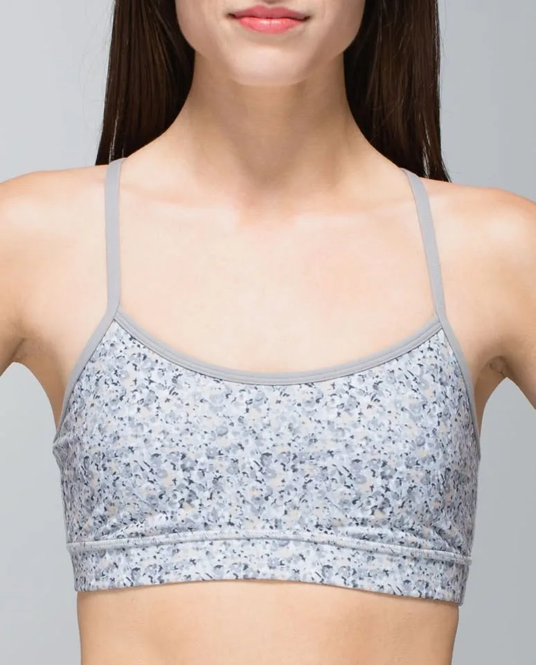 LULULEMON FLOW Y BRA...size 6...petit fleur...VGUC some fuzzing image indicator(2)