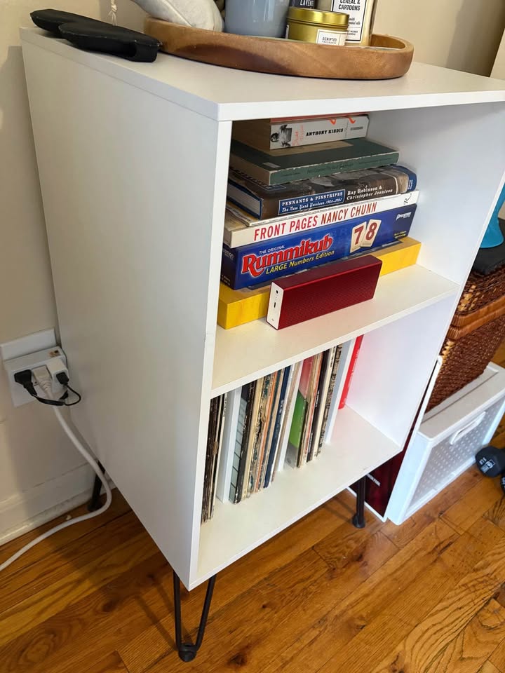 Record player stand with record in book storage shelves - photo 2