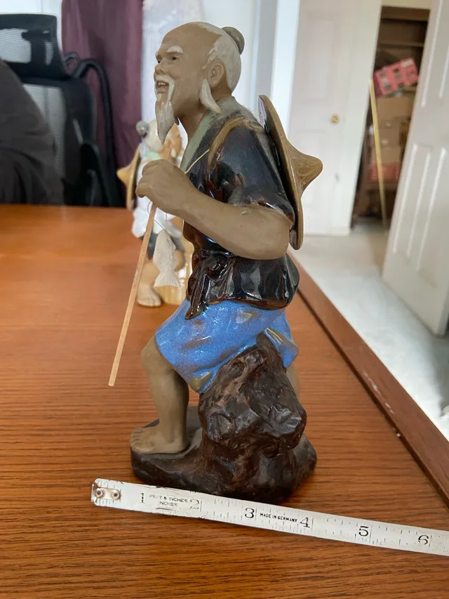 Fisherman Statue image indicator(2)