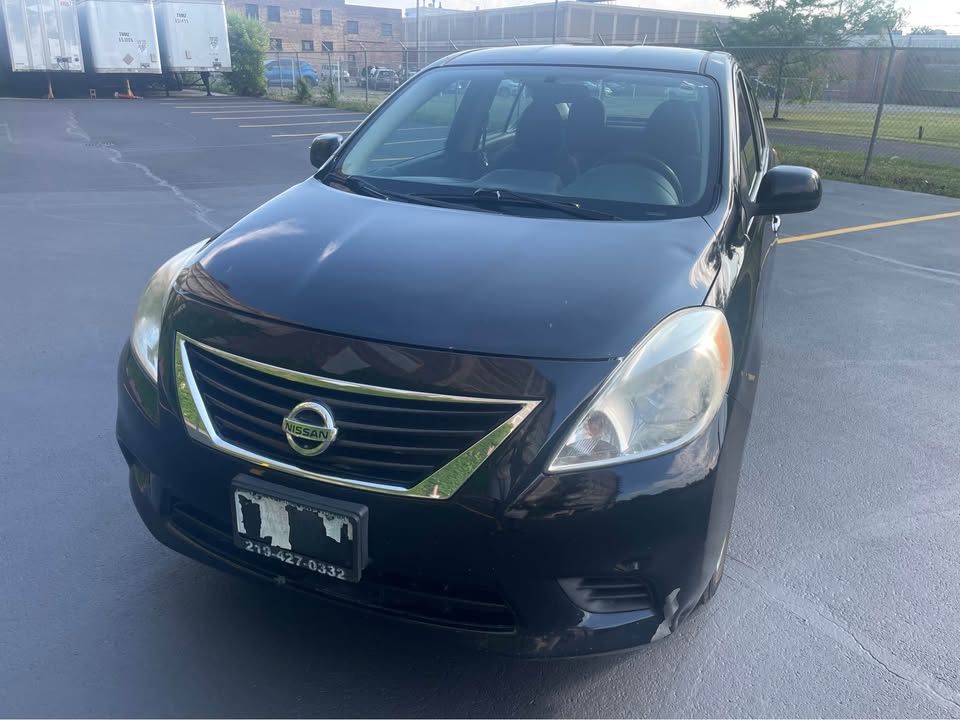 2013 Nissan Versa · SV Sedan 4D - photo 3