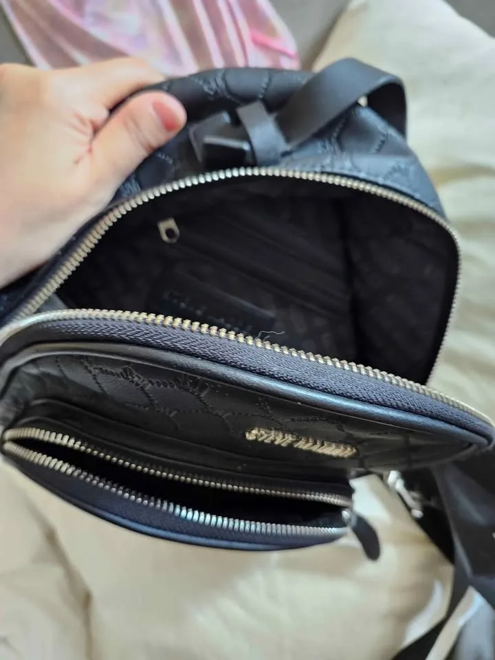 Steve Madden backpack with gold accents image indicator(4)