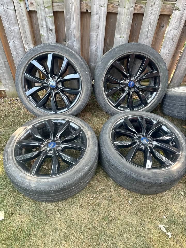 Set of OEM 19” Ford Escape Rims On Continental Tires