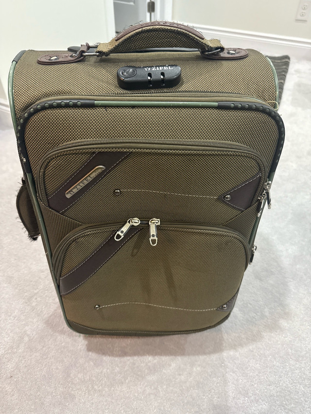 Carry on suitcase (Broken Handle)
