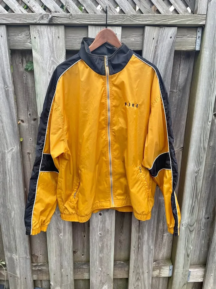 Black and yellow 90s Nike light jacket thumbnail