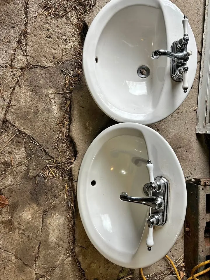 White Oval Sinks with Faucets thumbnail