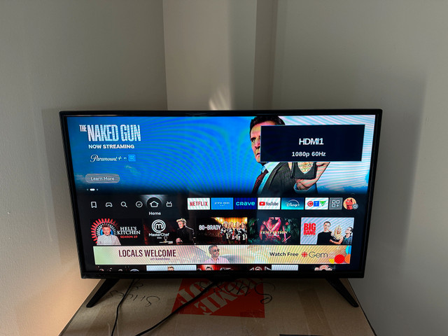 Insignia 32" UHD TV - photo 2
