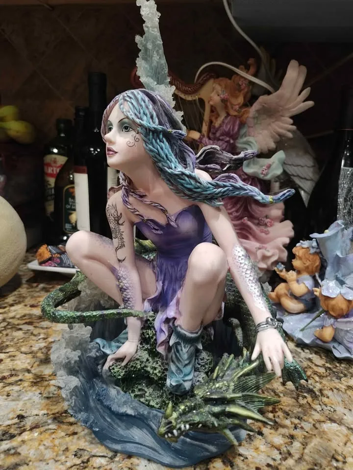 Fairy with Dragon statue image indicator(2)