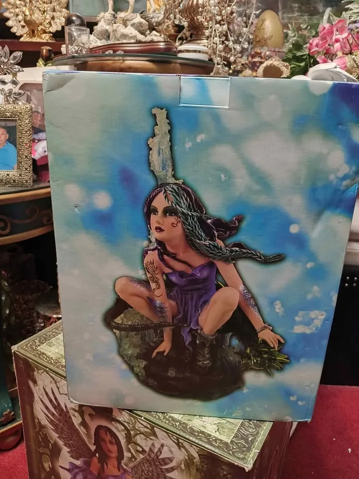 Fairy with Dragon statue image indicator(5)