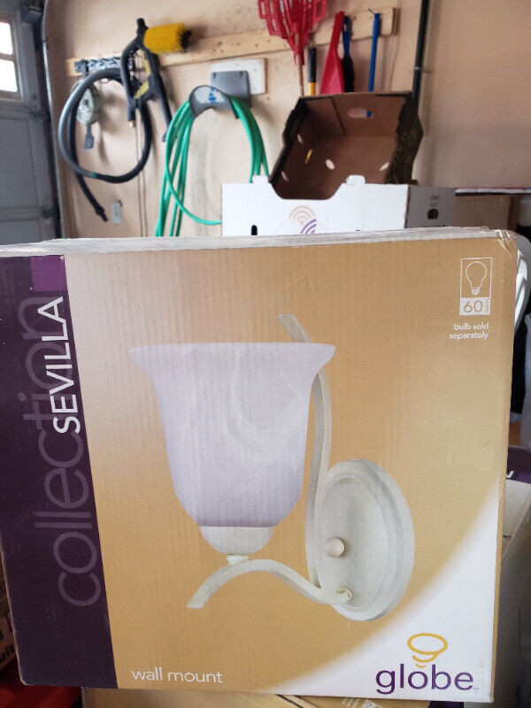 Wall sconce light by globe, Wall mount $20.