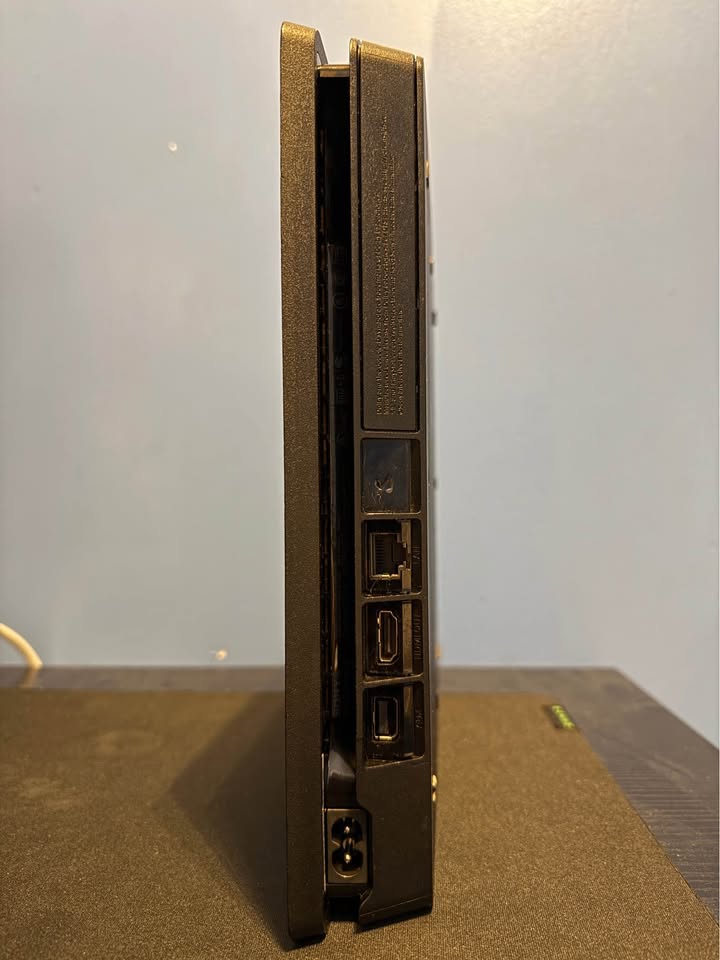 PlayStation 4 SLIM 1TB With 2 Controllers - photo 3