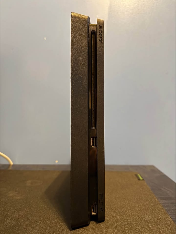 PlayStation 4 SLIM 1TB With 2 Controllers - photo 4