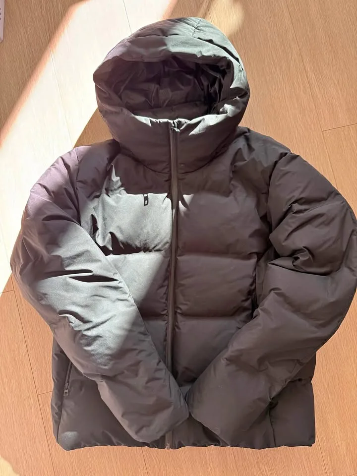 Uniqlo seamless puffer - black size L MENS thumbnail