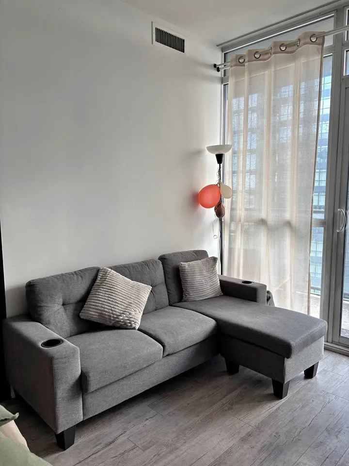 Grey L-Shaped 3-Seater Sofa in Excellent Condition ($200)