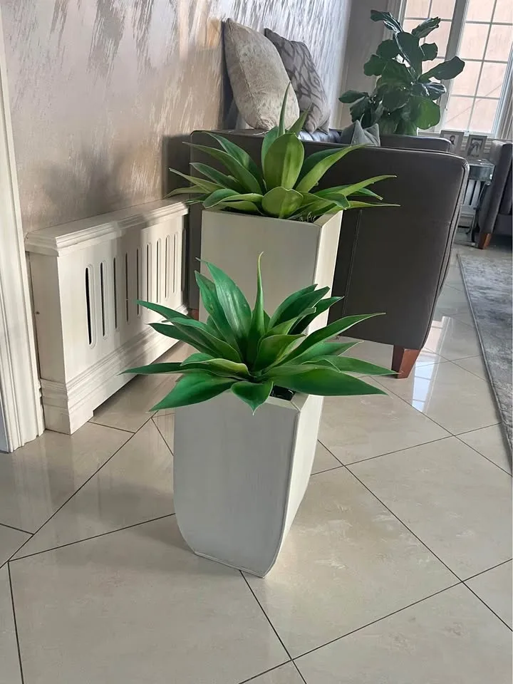 Artificial plants in tin pots thumbnail