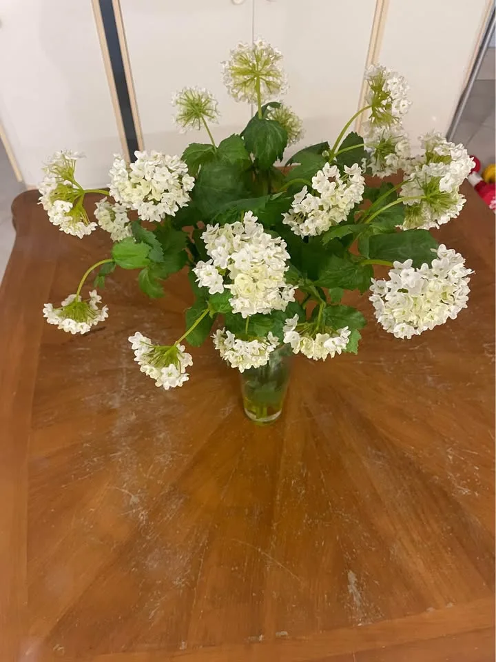Glass vase with faux flowers image indicator(2)