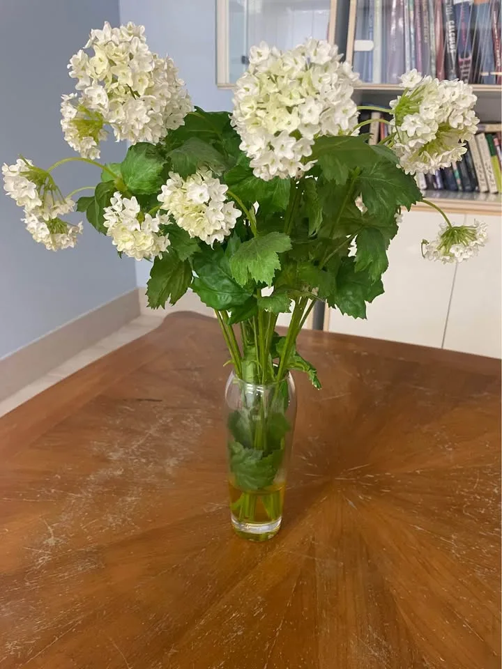 Glass vase with faux flowers image indicator(3)