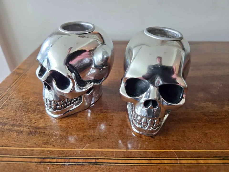 Pair of chrome metal skull candle holders, 2.75" thumbnail