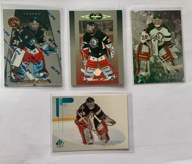 24 Dominik Hasek NHL Cards. 1 Autograph, 1 Rookie Card image indicator(4)