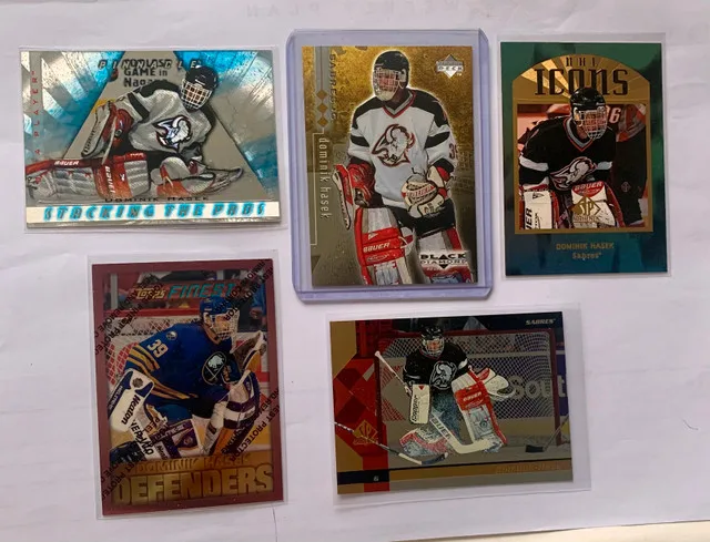 24 Dominik Hasek NHL Cards - 2 Rookie Cards image indicator(2)