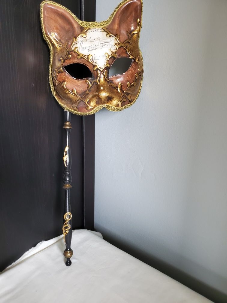 Brown and gold cat mask