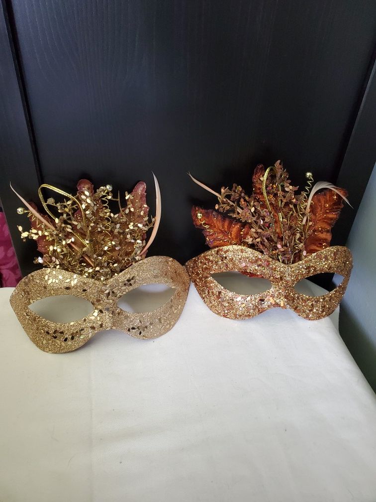 Two gold masks