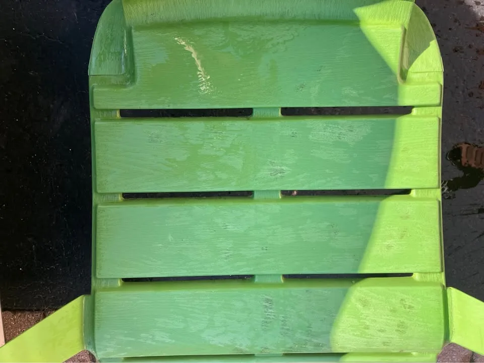 Four green muskoka chairs image indicator(2)