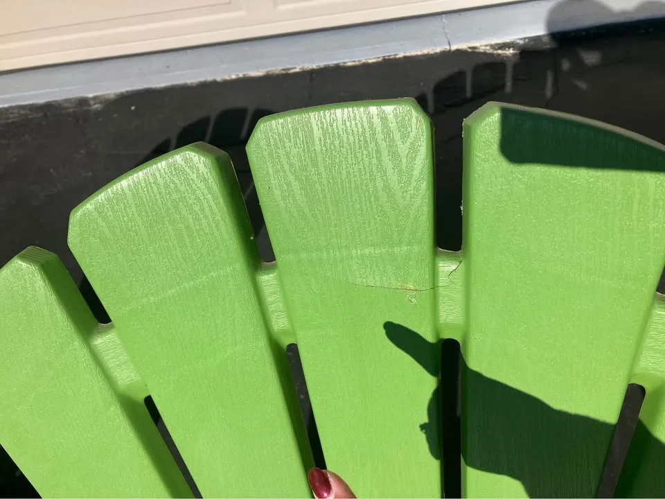 Four green muskoka chairs image indicator(4)