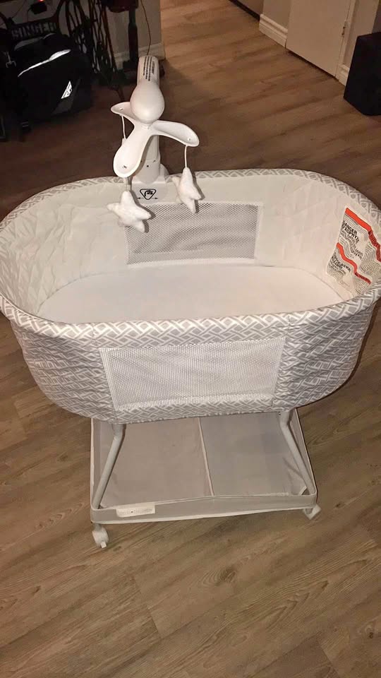 Bedside crib with sound,vibration, lights and movement