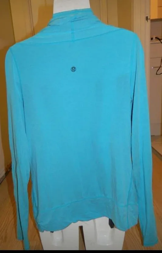 LULULEMON OASIS WRAP..size 4(rip tag)...GUC-VGUC image indicator(3)