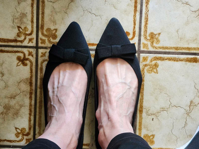 Black pointy flat shoes