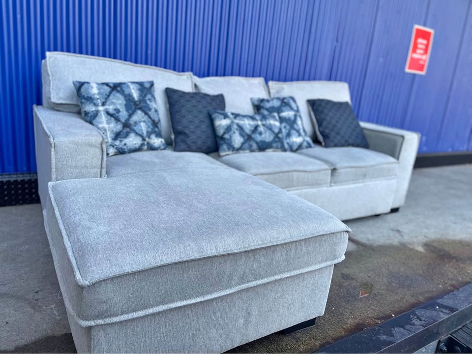 (FREE DELIVERY) Gray Bobs Furniture pullout bed sectional couch