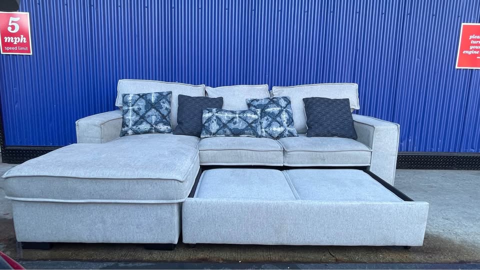 (FREE DELIVERY) Gray Bobs Furniture pullout bed sectional couch - photo 2