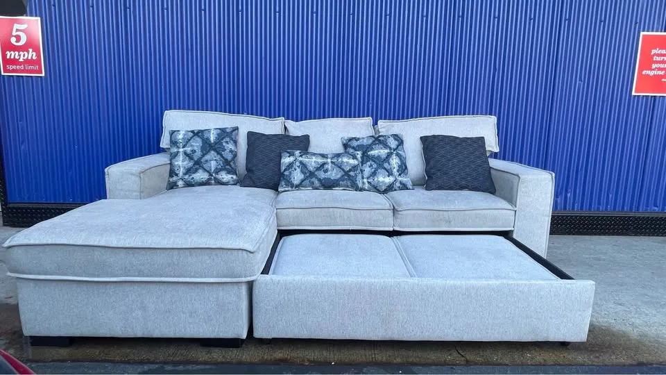 (FREE DELIVERY) Gray Bobs Furniture pullout bed sectional couch image indicator(2)