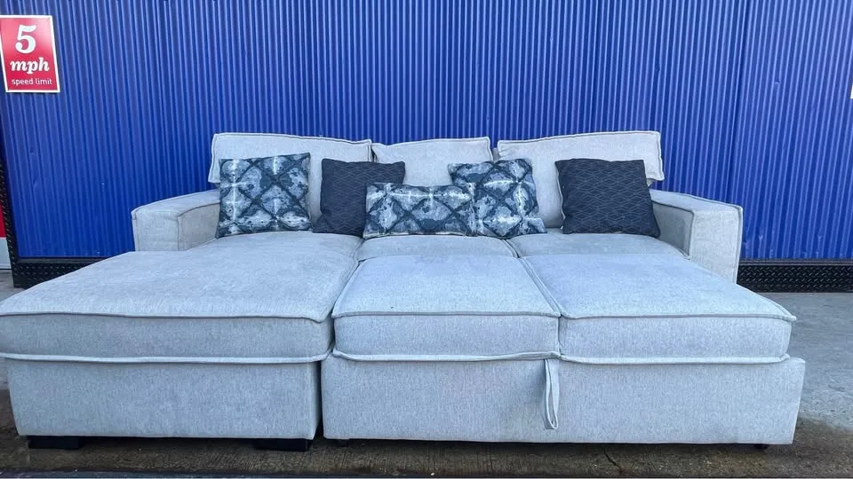 (FREE DELIVERY) Gray Bobs Furniture pullout bed sectional couch image indicator(3)