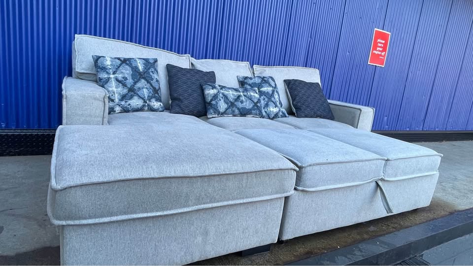 (FREE DELIVERY) Gray Bobs Furniture pullout bed sectional couch - photo 4